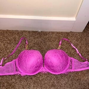 pink/purple colored Victoria’s Secret Very Sexy bra. with rinestone gold chain
